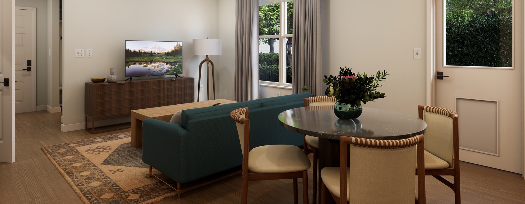dining room with table chairs and views into the living room